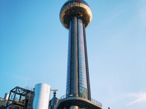 The colourful Hundertwasser-designed Fernwärme Spittelau incinerator tower in Vienna, topped by its golden ball.